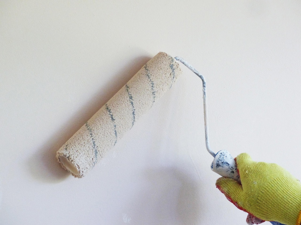Painting, white wall, paint roller — Best Indoor Planter Designs for Every Home