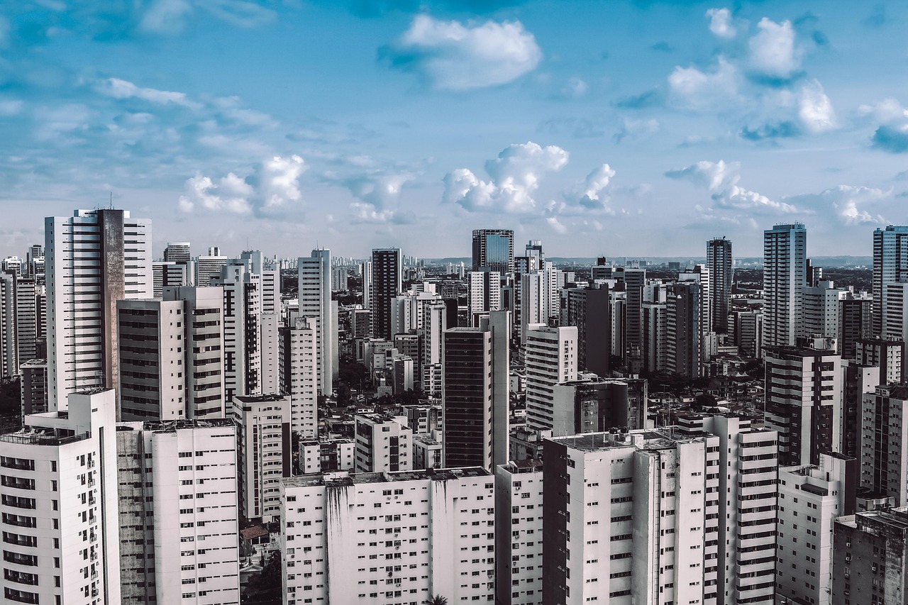 City, tower, architecture — What Benefits Do Government Loans Give Consumers?