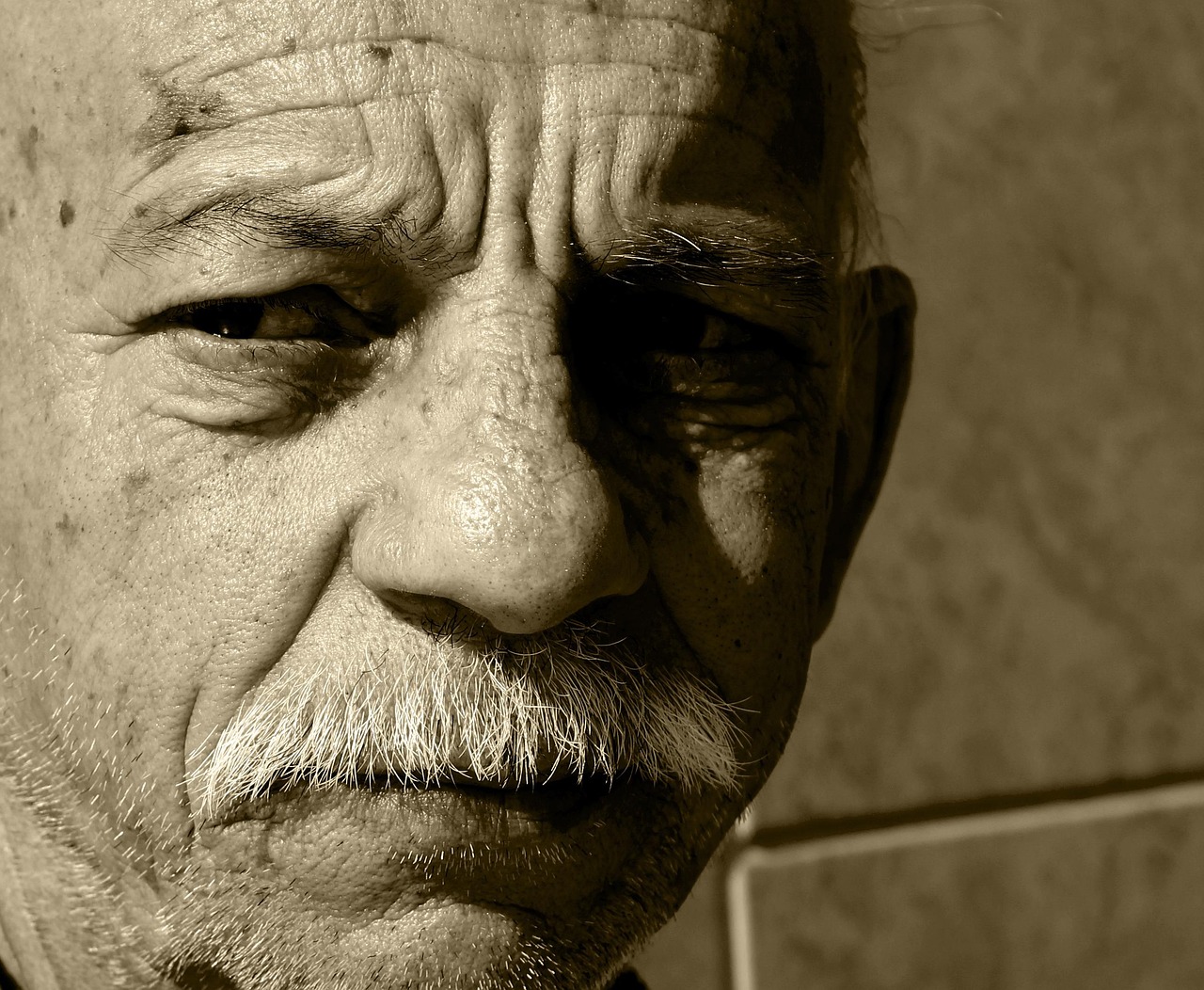 Man, senior, portrait — Why Investing in Tesla Powerwall Maui is Smart Business?